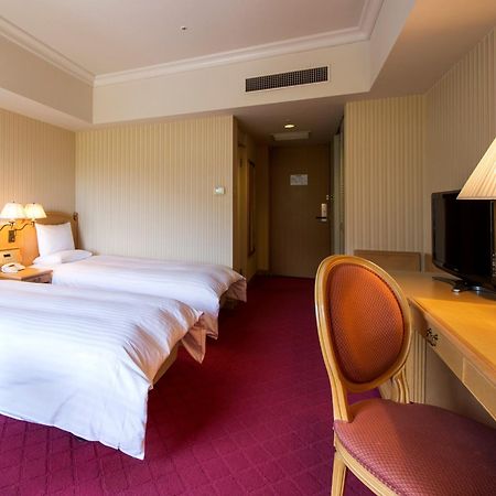 Hotel Okura Jr Huis Ten Bosch Sasebo Exteriér fotografie A room at the hotel