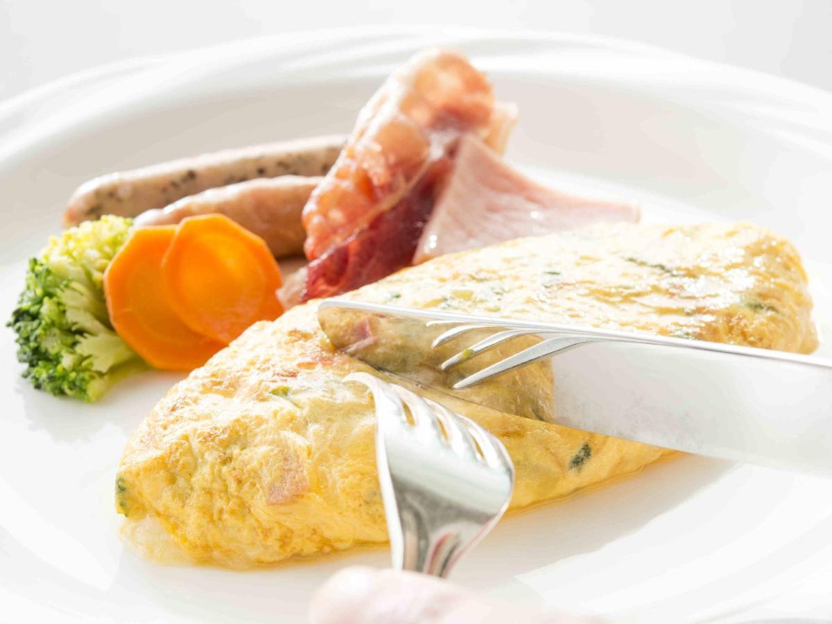 Hotel Okura Jr Huis Ten Bosch Sasebo Exteriér fotografie An omelette with ham and sausages