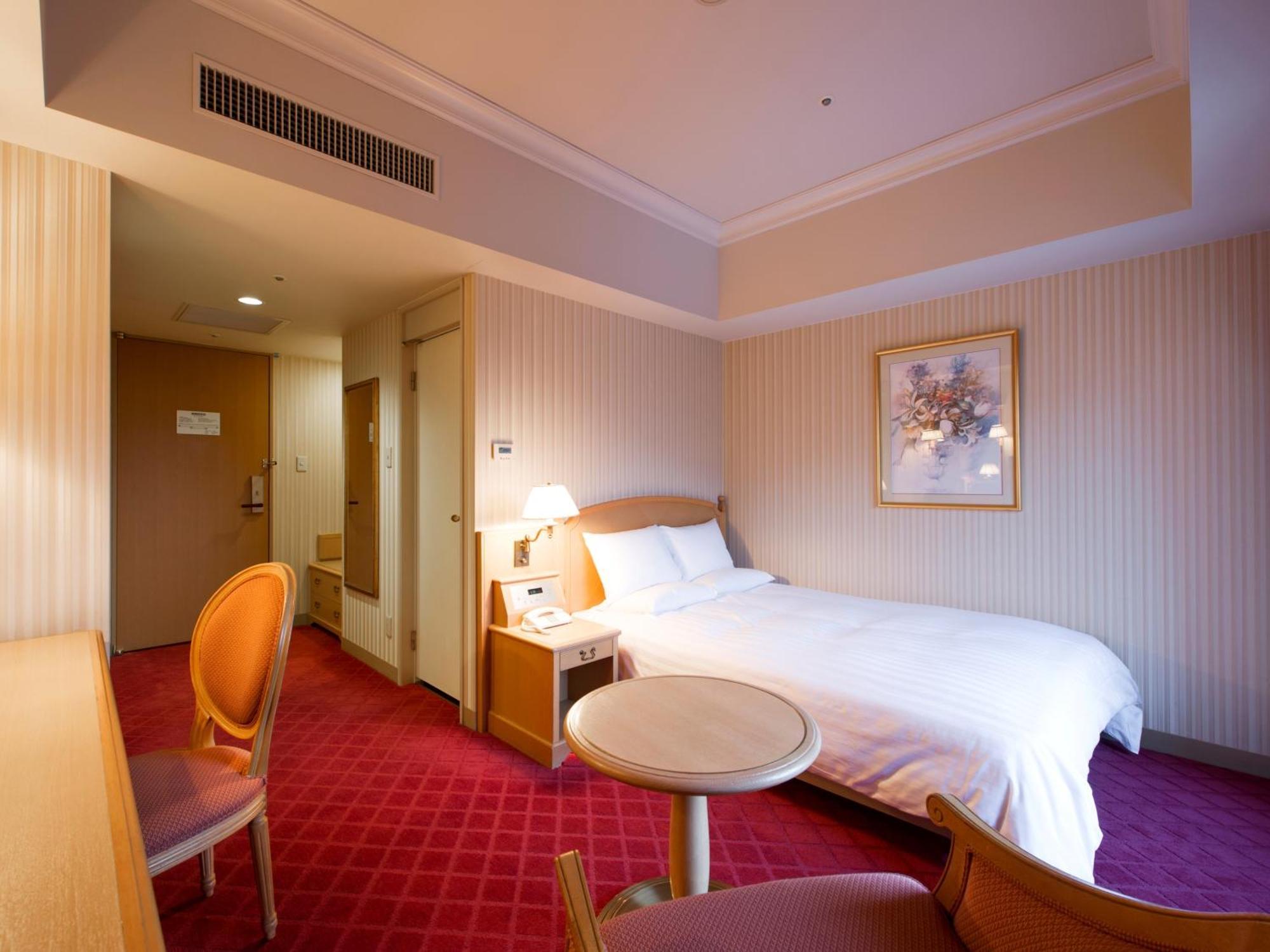 Hotel Okura Jr Huis Ten Bosch Sasebo Exteriér fotografie A room at the hotel