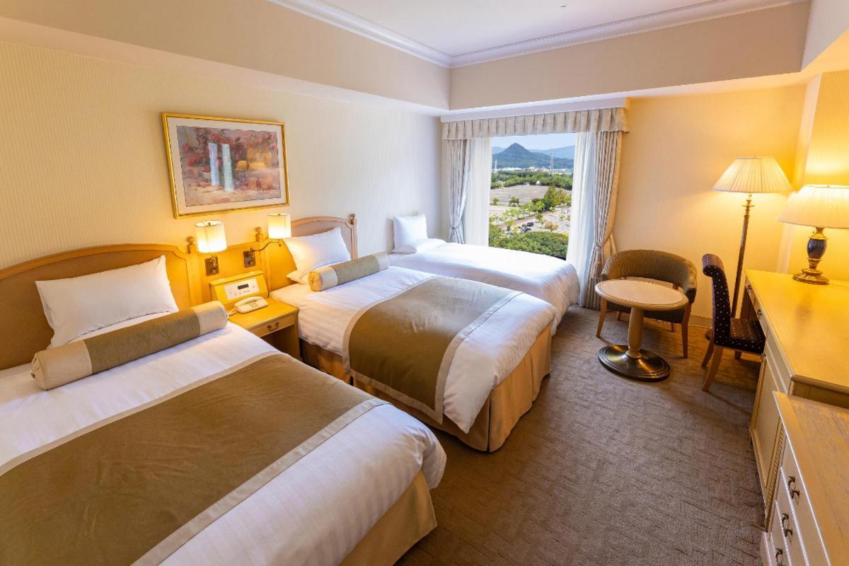 Hotel Okura Jr Huis Ten Bosch Sasebo Exteriér fotografie A room at the hotel